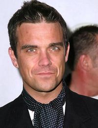 Robbie Williams face pe mediatorul