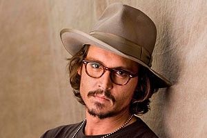 Johnny Depp "arunca" cu bani