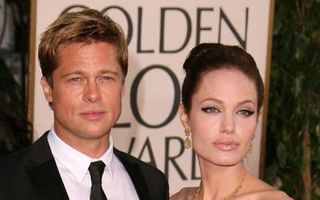 Angelina Jolie şi Brad Pitt vor să adopte un copil din România