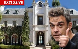 Robbie Williams, interesat  de casa lui Michael Jackson