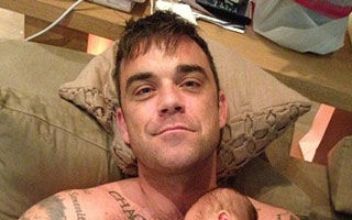Prima poză cu Robbie Williams şi fetiţa lui