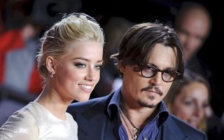 Johnny Depp s-a logodit cu Amber Heard
