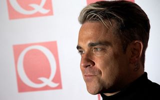 Robbie Williams vrea să revină în grupul Take That