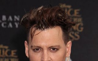 Johnny Depp, divorţ cu scandal: Soţia îl acuză că a bătut-o, fosta iubită îi ţine partea