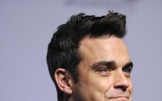 Robbie Williams ia peste picior România înainte de Euro 2016. Starul a fost apostrofat pe Facebook - VIDEO